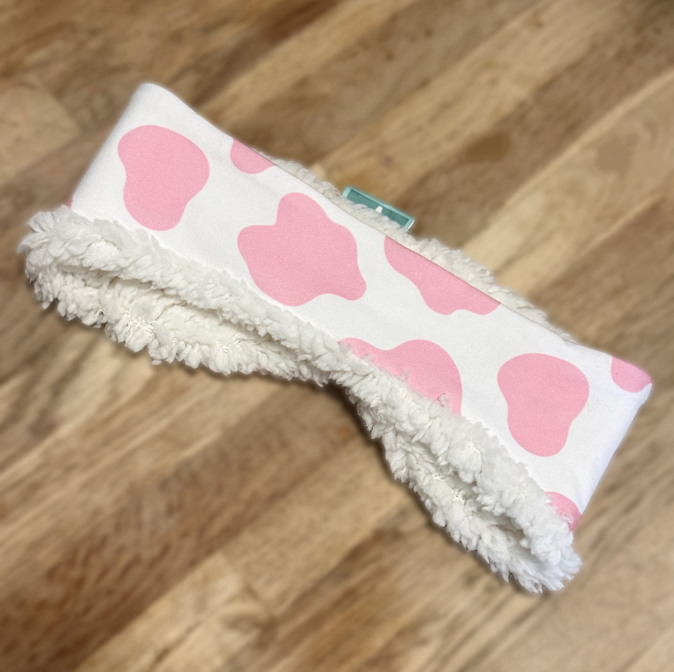 Handmade pink cow print ear warmers